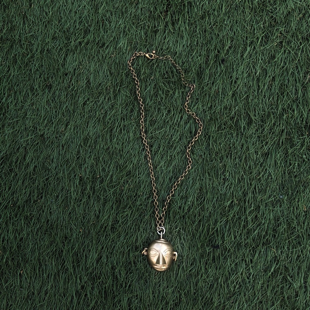 African bronze head pendant chain